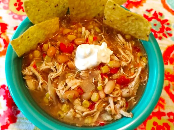 An overhead shot of a bowl filled with white bean chicken chili