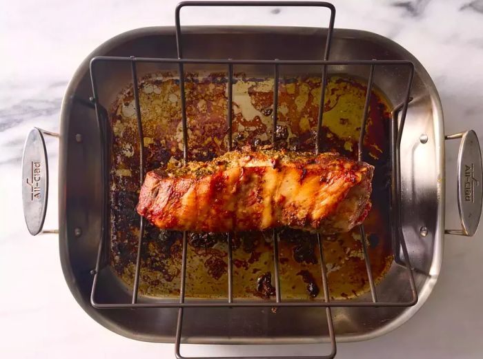 Pork turned over and roasted with the skin-side facing up