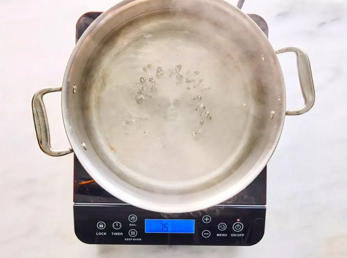 A pot of gently simmering water