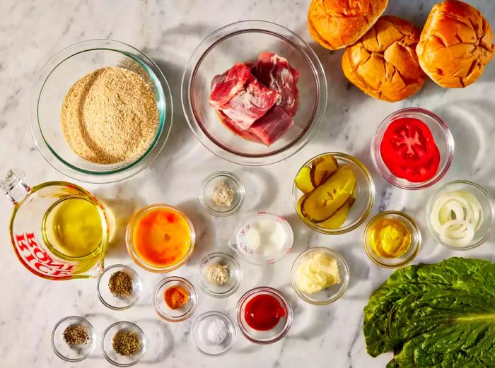 All ingredients prepared for making the classic Indiana breaded tenderloin sandwich.