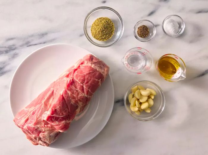 Ingredients prepared for making Puerto Rican-style roast pork