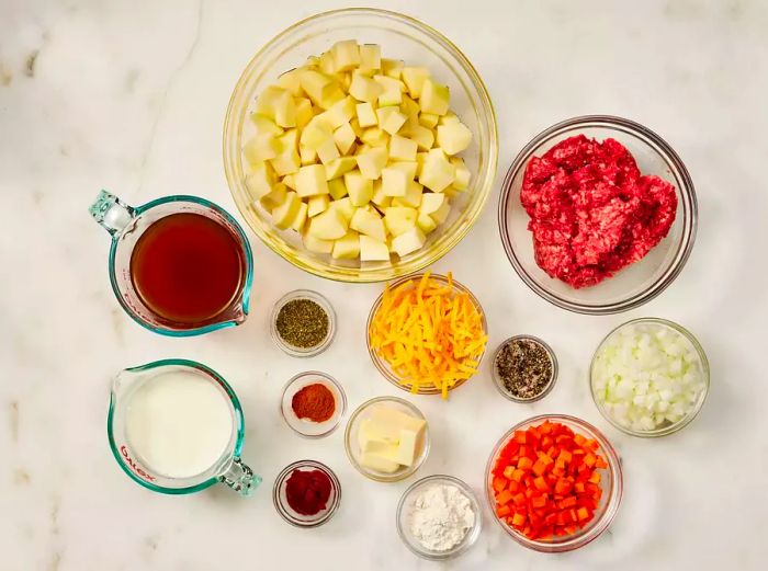 Ingredients for cottage pie include potatoes, ground beef, and a variety of vegetables.