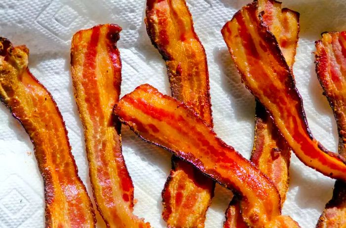 bacon cooked on a paper towel