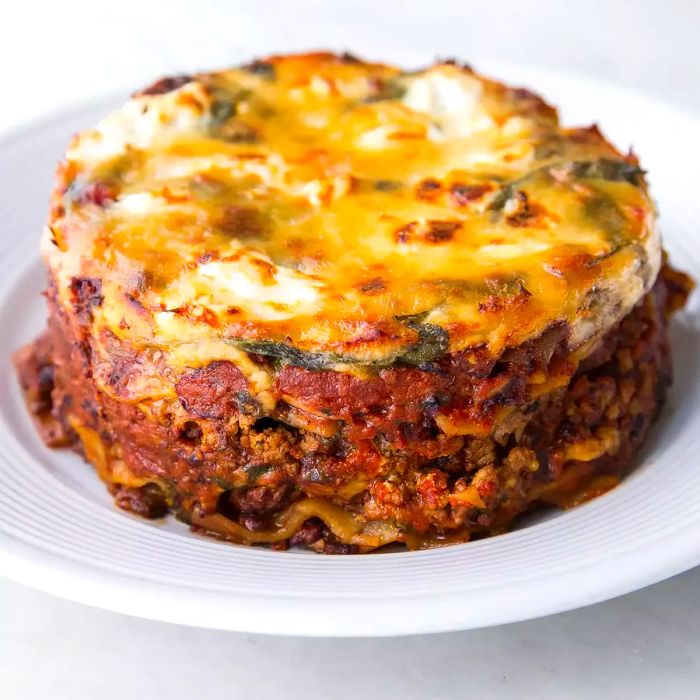 A close-up shot of Instant Pot Lasagna served on a white plate.