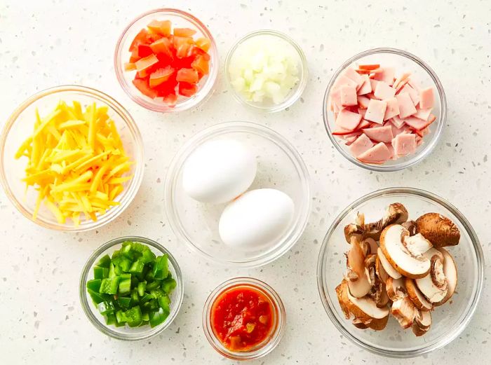 All the ingredients prepared and ready to make an omelet in a bag.