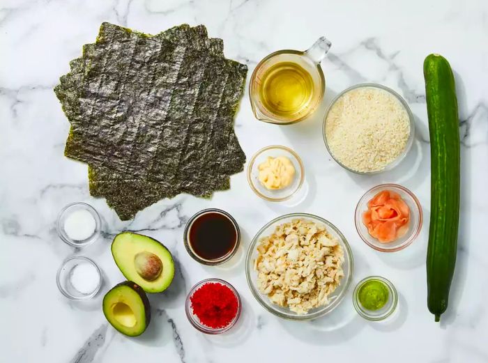 All the ingredients are prepared and ready for making California rolls.