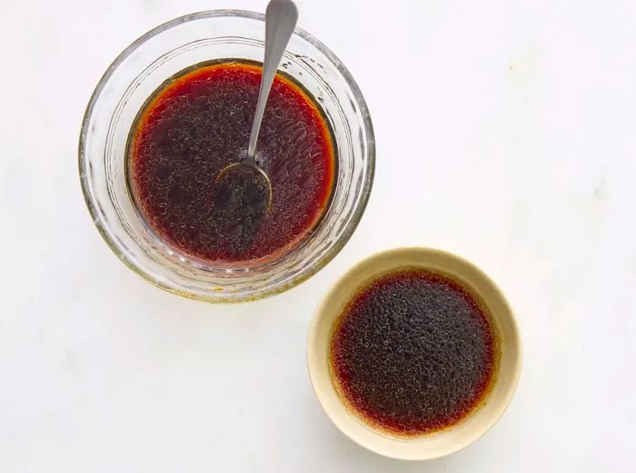 One small bowl of soy-mirin sauce and another small bowl with soy-mirin-vinegar sauce.