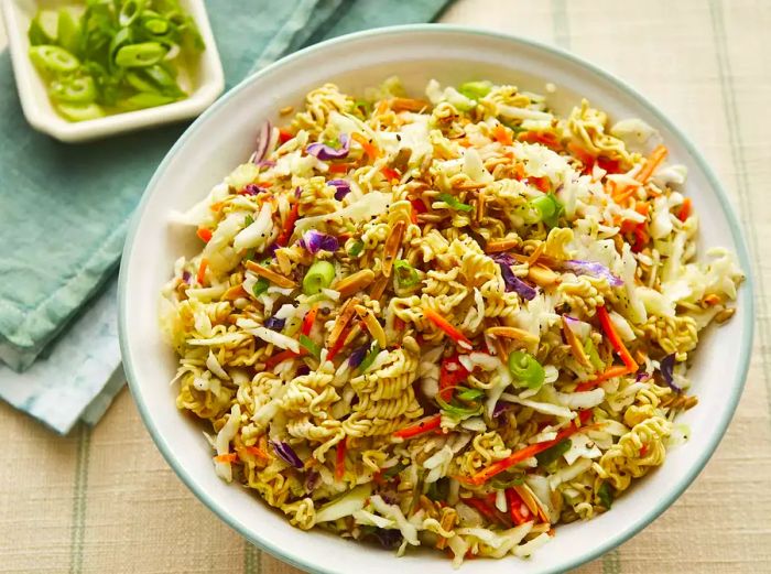 Aerial view of a large bowl filled with vibrant ramen salad