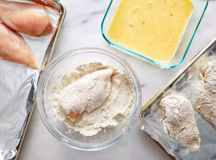 Bird's-eye view of the chicken breading station in action