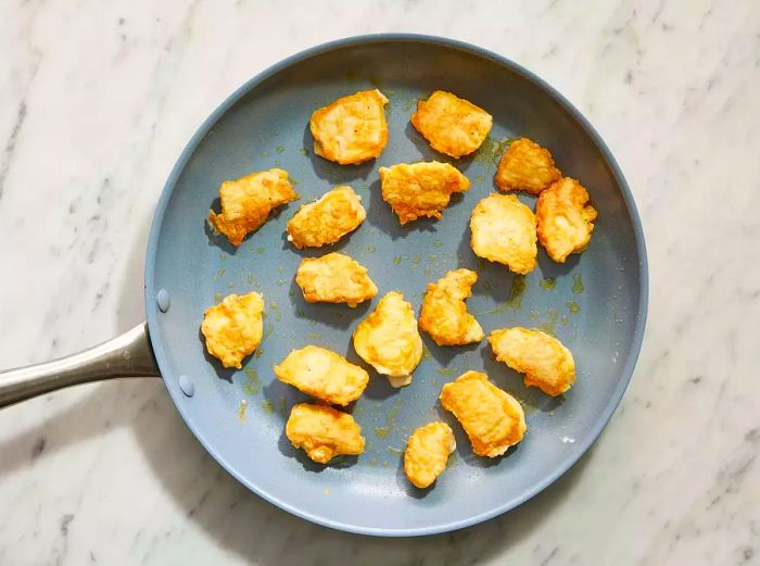 Pan-frying the Firecracker Chicken