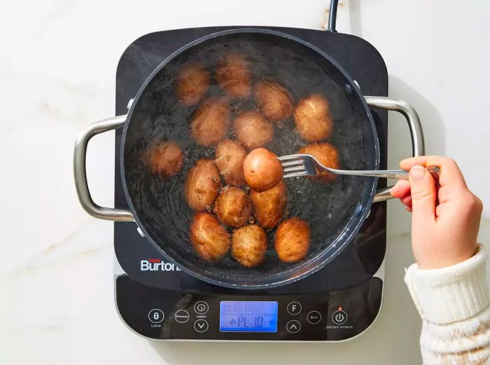 Potatoes boiled until they are soft and tender.