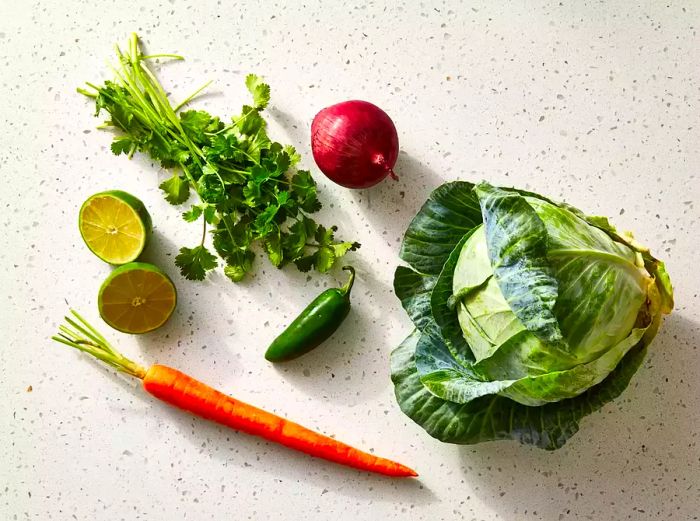 All ingredients prepared for making taco slaw