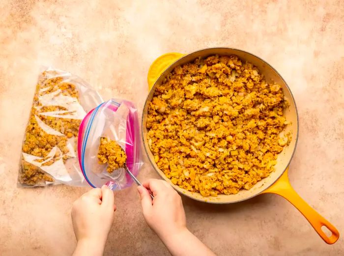 Spoon the cooked stuffing into a large resealable bag for storage.