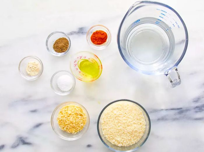 A top-down view of all the ingredients for Cindy's Golden Rice