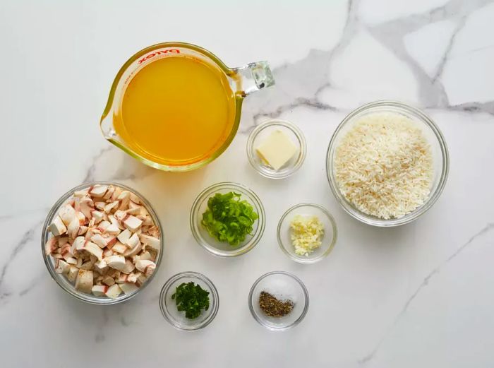 A top-down view showcasing all the ingredients needed for mushroom rice.