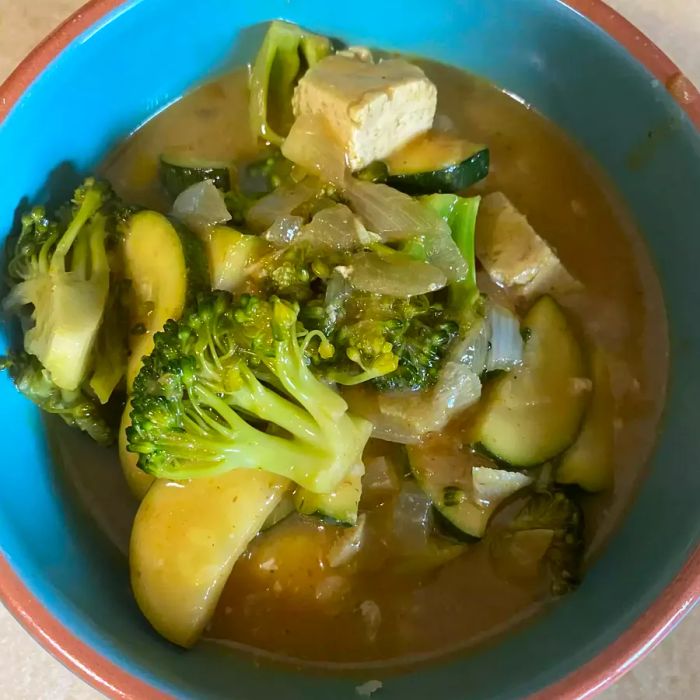 Vegan Keto-Friendly Thai Yellow Curry served in a blue bowl