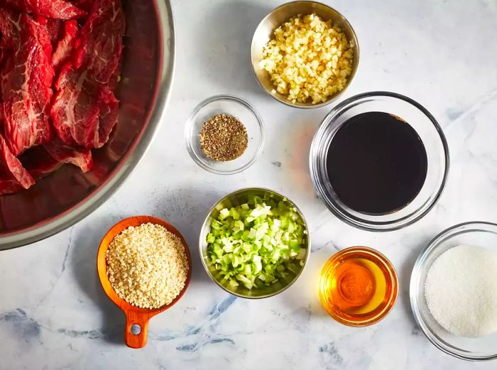 An overhead shot of all the ingredients assembled for making beef bulgogi.