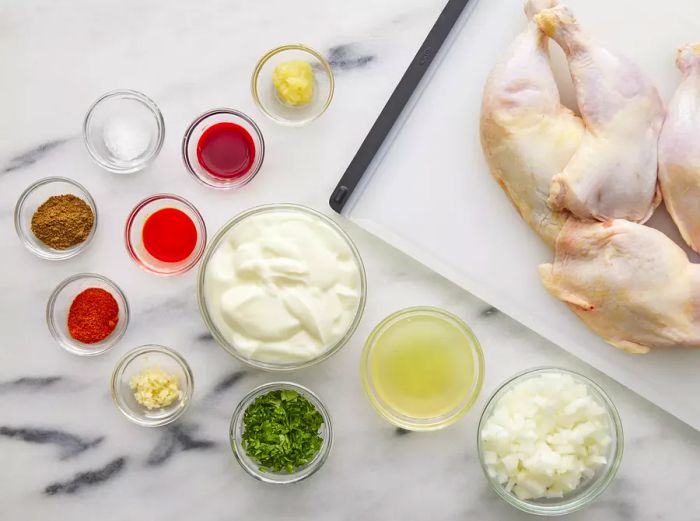 All ingredients prepared for making authentic Indian Tandoori Chicken