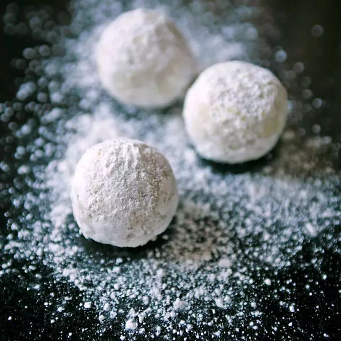 Russian Tea Cookies dusted with a generous coating of powdered sugar