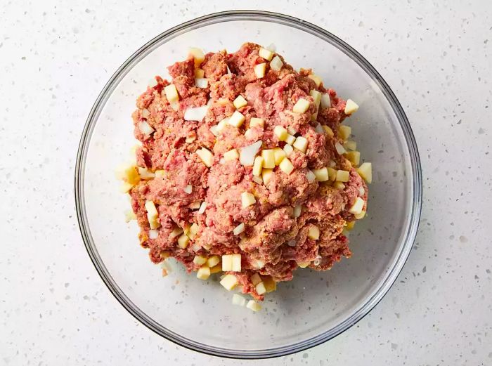 Combine all meatloaf ingredients in a bowl and mix until well incorporated.