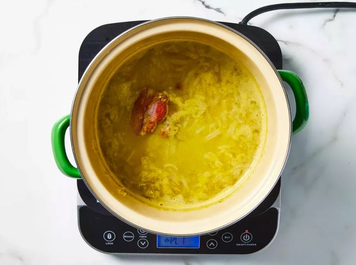 Ingredients gently simmering in the large stockpot.