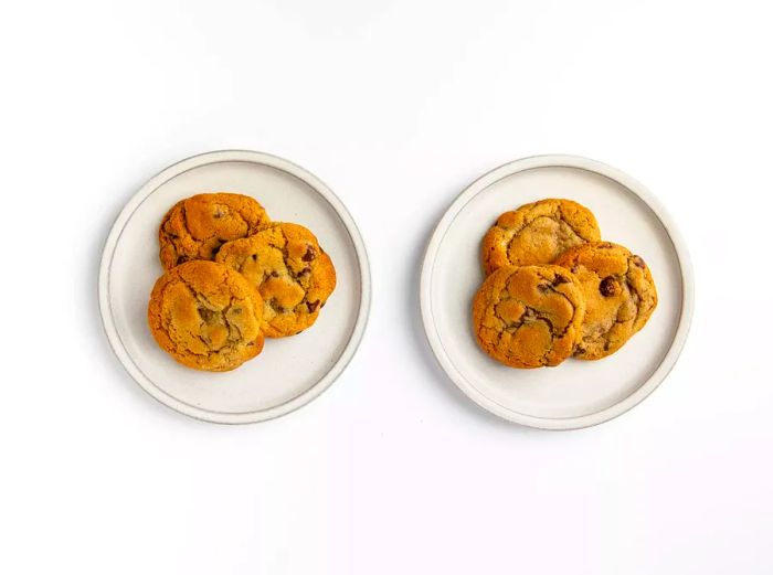 two trays of chocolate chip cookies