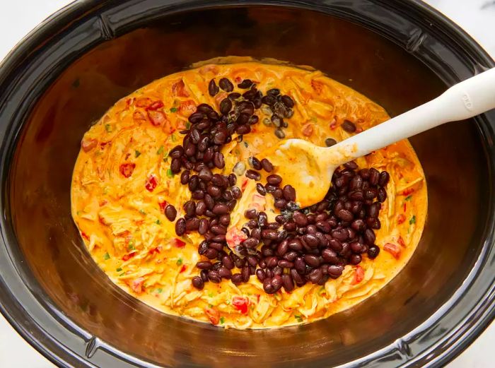 Black beans stirred into the dip and cooked until fully heated through.