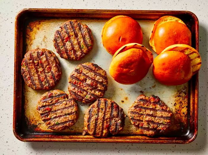 Grilled patties cooked to your liking, served on toasted hamburger buns.