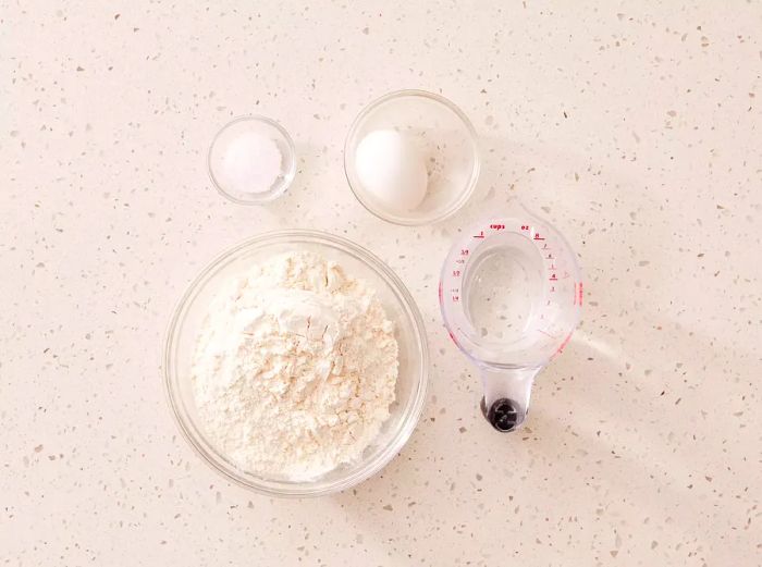 Ingredients for making homemade wonton wrappers