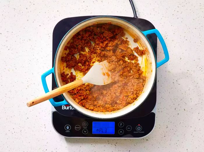 tomato paste, ketchup, and spices mixed into ground beef