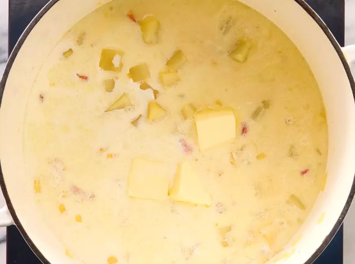 Half-and-half and butter added to the pot