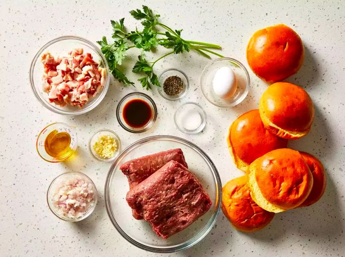 All ingredients are ready to prepare the venison bacon burgers.