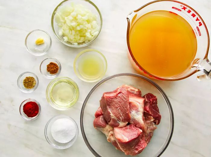 Prepare all the ingredients for making pork carnitas.