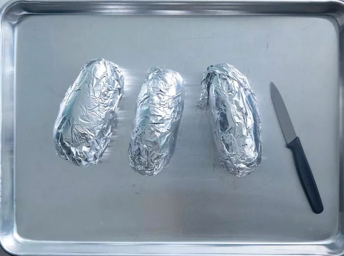 Potatoes wrapped in aluminum foil