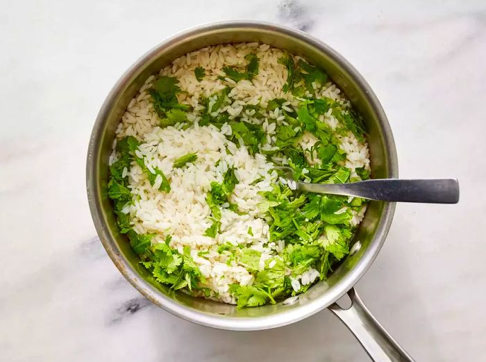 Cilantro, lime juice, and zest added to the rice just before serving.