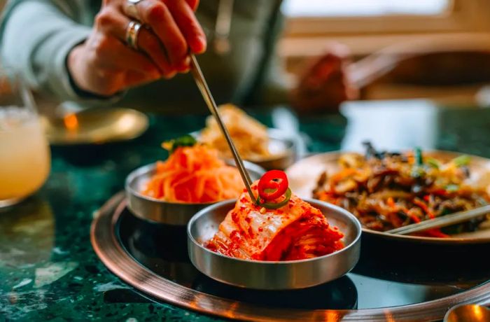 Those who are sensitive to spice often struggle to enjoy kimchi, the traditional Korean fermented vegetables, because of its fiery heat.