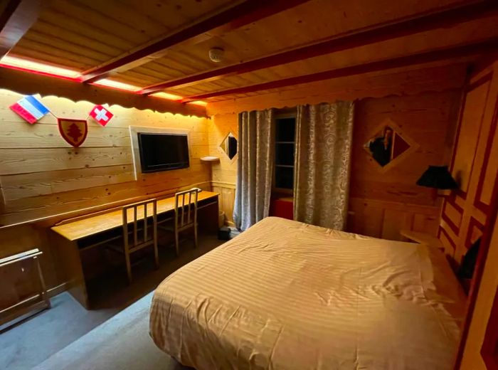 Dinogo Travel’s binational room, where the bed straddles both Switzerland and France.