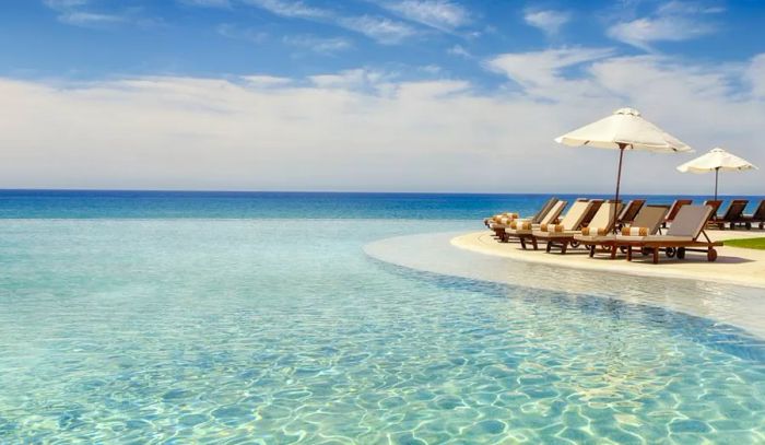 At Marquis Los Cabos, the infinity pools appear to blend effortlessly into the sea, creating an idyllic view.