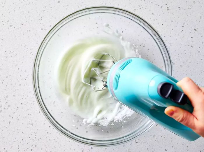 Egg whites beaten until stiff peaks are formed
