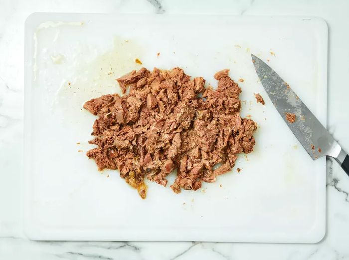 Beef tongue cut into bite-sized chunks.