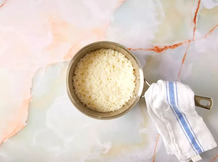Cooked rice in a saucepan.