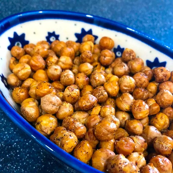 Seasoned dry-roasted chickpeas served in a white and blue bowl