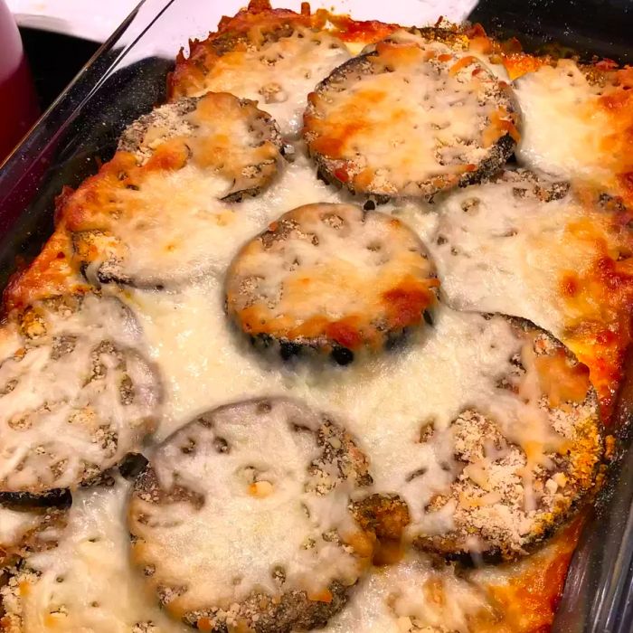 Baked Eggplant Parmesan served in a glass dish