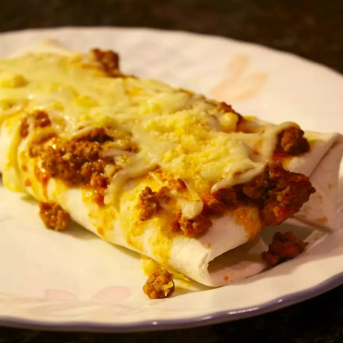 Lasagna Burritos served on a white plate