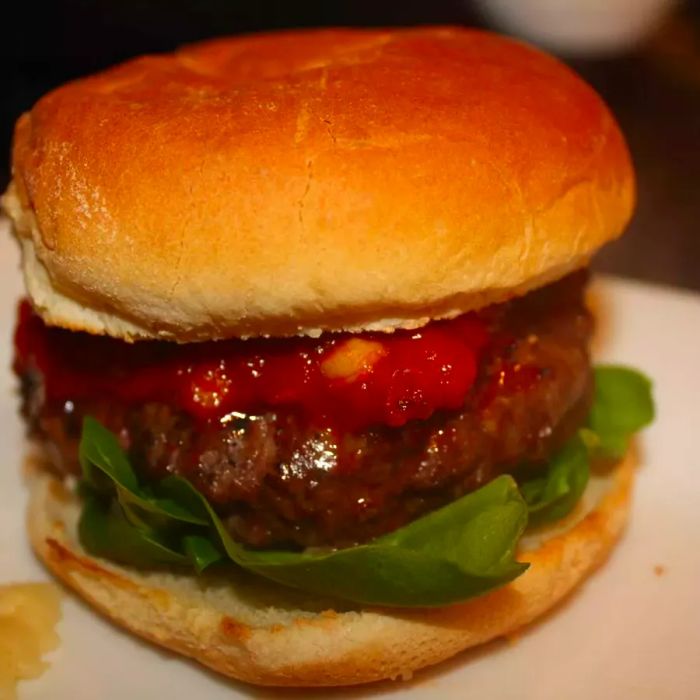 Lasagna Burgers served on a white plate