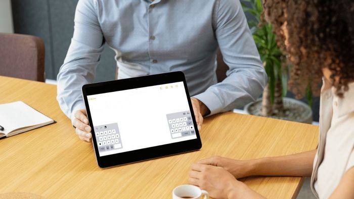 Hướng dẫn khôi phục kích thước bàn phím iPad về trạng thái bình thường.
