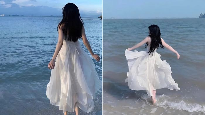 Tạo dáng chụp ảnh biển từ phía sau lưng