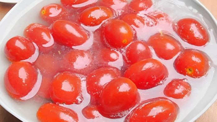 Cách làm mứt cà chua bi nguyên quả dẻo ngon – Bước 2