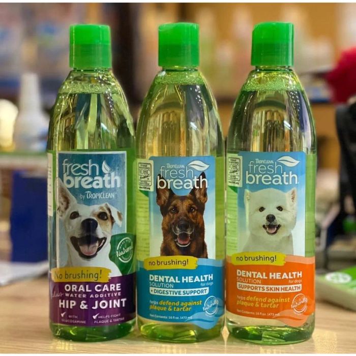 TROPICLEAN Fresh Breath Water Additive for pets provides mouthwash and coat care for dogs and cats. Image 2
