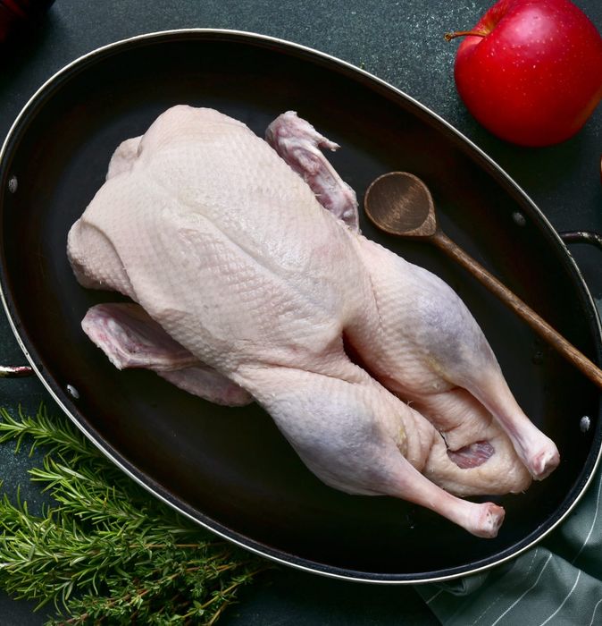 The duck meat needs to be prepped to eliminate any unwanted smell, as seen in the image.